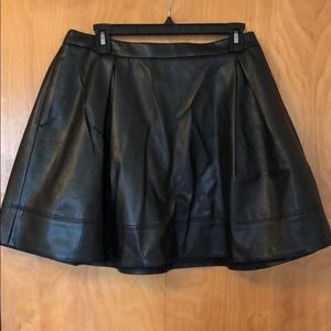 A black pleather skirt